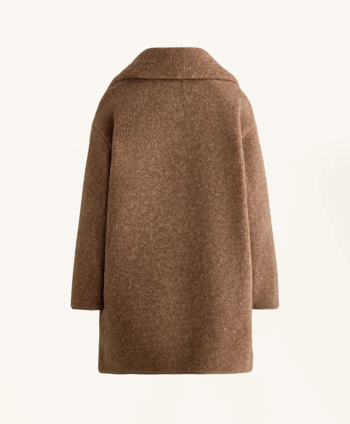 Lange Jacke aus Lammfelljacke Lange Jacke aus Lammfelljacke