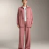 Lange Jacke mit verstellbarer Taille und gestreifter Struktur Lange Jacke mit verstellbarer Taille und gestreifter Struktur