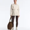 Lange Piqué-Jacke aus Baumwolle mit Gürtel Lange Piqué-Jacke aus Baumwolle mit Gürtel