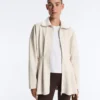Lange Piqué-Jacke aus Baumwolle mit Gürtel Lange Piqué-Jacke aus Baumwolle mit Gürtel