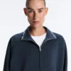 Lange Piqué-Jacke mit kontrastierender Baumwollpaspel Lange Piqué-Jacke mit kontrastierender Baumwollpaspel