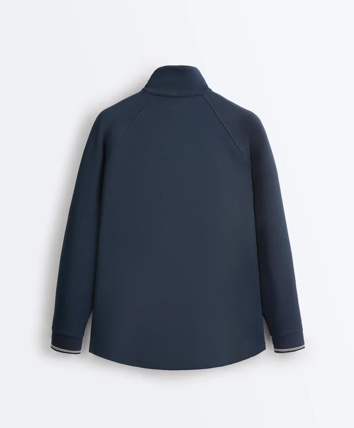 Lange Piqué-Jacke mit kontrastierender Baumwollpaspel Lange Piqué-Jacke mit kontrastierender Baumwollpaspel