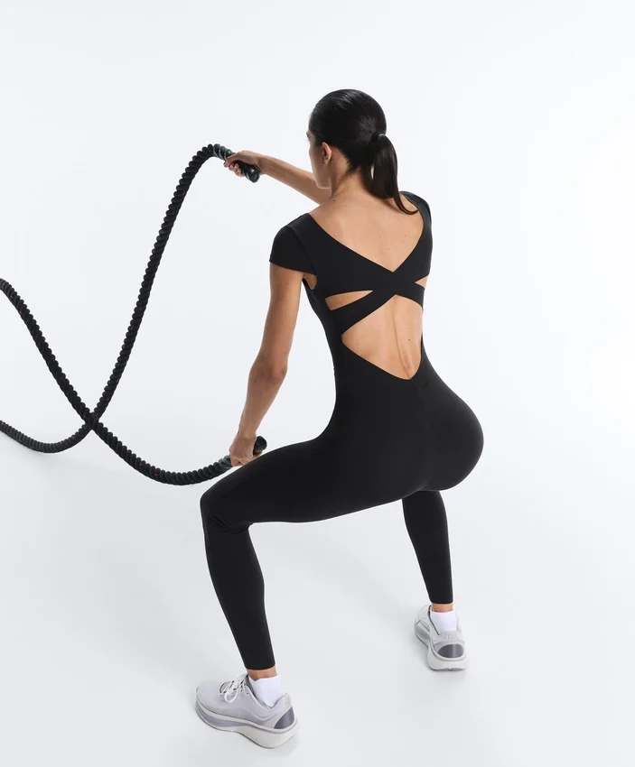 Langer Compressive Jumpsuit mit kurzen Ärmeln Langer Compressive Jumpsuit mit kurzen Ärmeln
