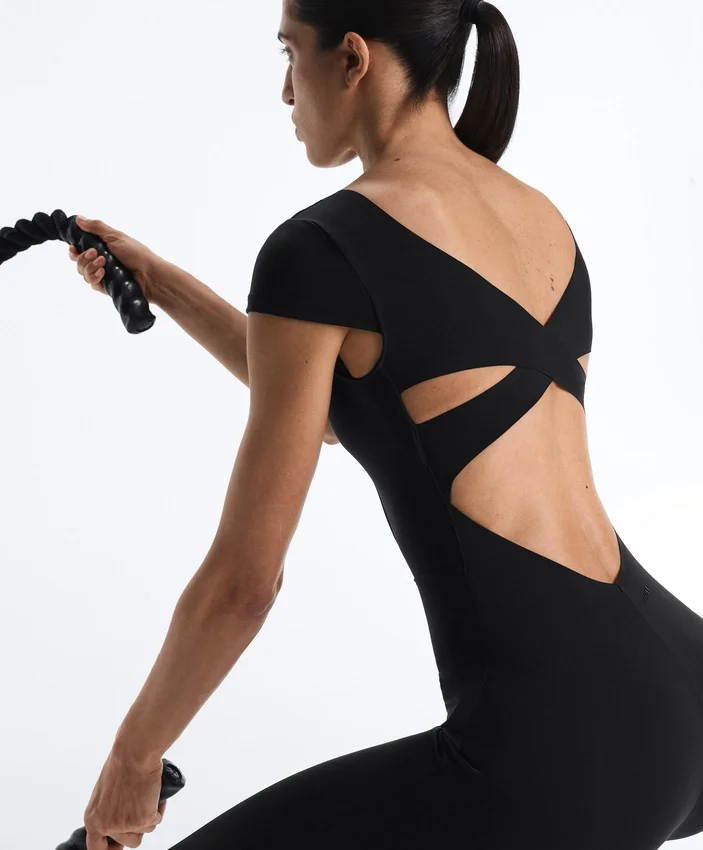 Langer Compressive Jumpsuit mit kurzen Ärmeln Langer Compressive Jumpsuit mit kurzen Ärmeln