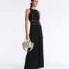Langer Piqué-Jumpsuit mit Paspelierung aus Baumwolle Langer Piqué-Jumpsuit mit Paspelierung aus Baumwolle