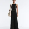 Langer Piqué-Jumpsuit mit Paspelierung aus Baumwolle Langer Piqué-Jumpsuit mit Paspelierung aus Baumwolle