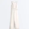 Langer Piqué-Jumpsuit mit Paspelierung aus Baumwolle Langer Piqué-Jumpsuit mit Paspelierung aus Baumwolle