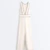 Langer Piqué-Jumpsuit mit Paspelierung aus Baumwolle Langer Piqué-Jumpsuit mit Paspelierung aus Baumwolle