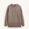 Langer Strickpullover mit Kapuze