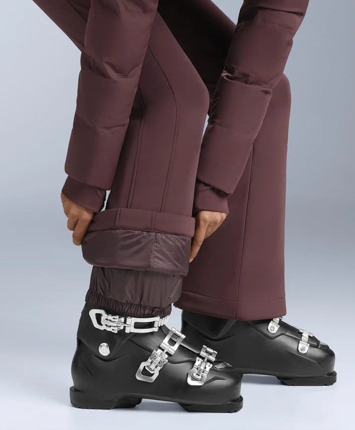 Minardi Piume Ski – wasserabweisender, gefütterter Jumpsuit mit 80 % Daunen- und 20 % Federfüllung Minardi Piume Ski – wasserabweisender, gefütterter Jumpsuit mit 80 % Daunen- und 20 % Federfüllung