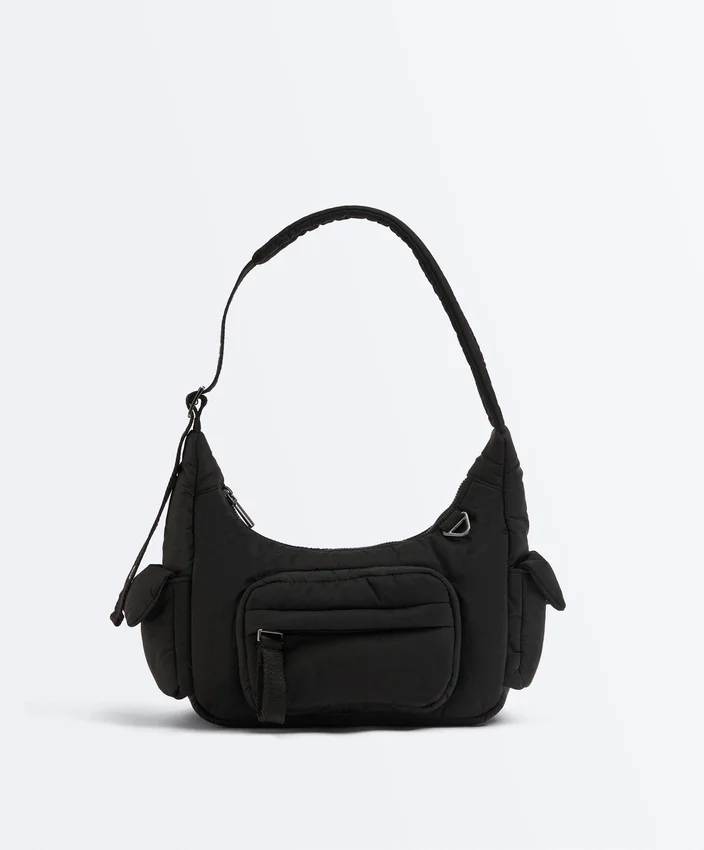Mini-Tasche mit Maxi-Taschen Mini-Tasche mit Maxi-Taschen