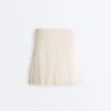 Nahtloser kurzer Faltenrock mit hoher Taille als Short Nahtloser kurzer Faltenrock mit hoher Taille als Short