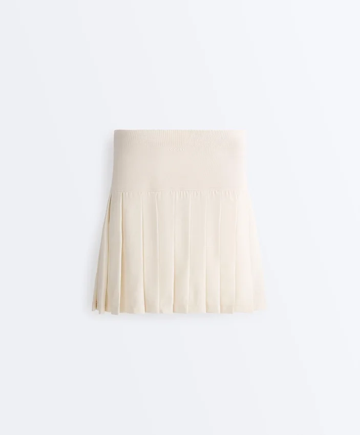 Nahtloser kurzer Faltenrock mit hoher Taille als Short Nahtloser kurzer Faltenrock mit hoher Taille als Short