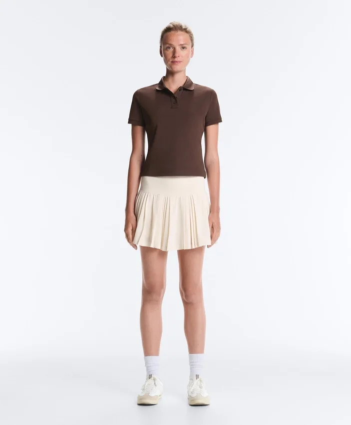 Nahtloser kurzer Faltenrock mit hoher Taille als Short Nahtloser kurzer Faltenrock mit hoher Taille als Short