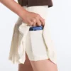 Nahtloser kurzer Faltenrock mit hoher Taille als Short Nahtloser kurzer Faltenrock mit hoher Taille als Short