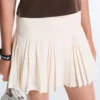 Nahtloser kurzer Faltenrock mit hoher Taille als Short Nahtloser kurzer Faltenrock mit hoher Taille als Short