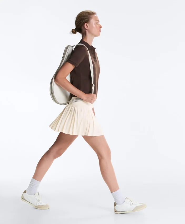 Nahtloser kurzer Faltenrock mit hoher Taille als Short Nahtloser kurzer Faltenrock mit hoher Taille als Short