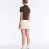 Nahtloser kurzer Faltenrock mit hoher Taille als Short Nahtloser kurzer Faltenrock mit hoher Taille als Short