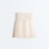 Nahtloser kurzer Faltenrock mit hoher Taille als Short Nahtloser kurzer Faltenrock mit hoher Taille als Short