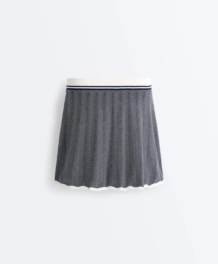 Nahtloser Rock aus Fischgräten-Strick mit hoher Taille Nahtloser Rock aus Fischgräten-Strick mit hoher Taille
