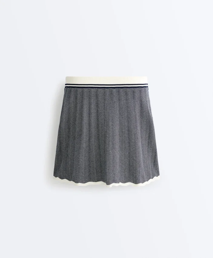 Nahtloser Rock aus Fischgräten-Strick mit hoher Taille Nahtloser Rock aus Fischgräten-Strick mit hoher Taille