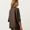 Oversize-Hemd mit kurzen Ärmeln aus 100 % Leinen Oversize-Hemd mit kurzen Ärmeln aus 100 % Leinen