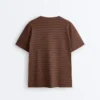 Oversize-T-Shirt aus Baumwollmischung mit kurzen Ärmeln und Streifen auf der Vorderseite Oversize-T-Shirt aus Baumwollmischung mit kurzen Ärmeln und Streifen auf der Vorderseite