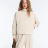 Piqué-Jacke mit hohem Kragen aus Baumwolle Piqué-Jacke mit hohem Kragen aus Baumwolle