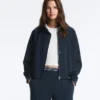 Piqué-Jacke mit kontrastierender Paspelierung aus Baumwolle Piqué-Jacke mit kontrastierender Paspelierung aus Baumwolle