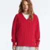 Pullover aus 100 % Baumwolle mit Zopfmuster und V-Ausschnitt Pullover aus 100 % Baumwolle mit Zopfmuster und V-Ausschnitt