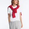 Pullover aus 100 % Baumwolle mit Zopfmuster und V-Ausschnitt Pullover aus 100 % Baumwolle mit Zopfmuster und V-Ausschnitt