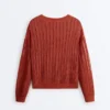 Pullover aus offenem Rippenstrick Pullover aus offenem Rippenstrick
