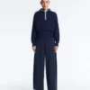 Pullover mit halbem Reißverschluss und hohem Kragen Pullover mit halbem Reißverschluss und hohem Kragen