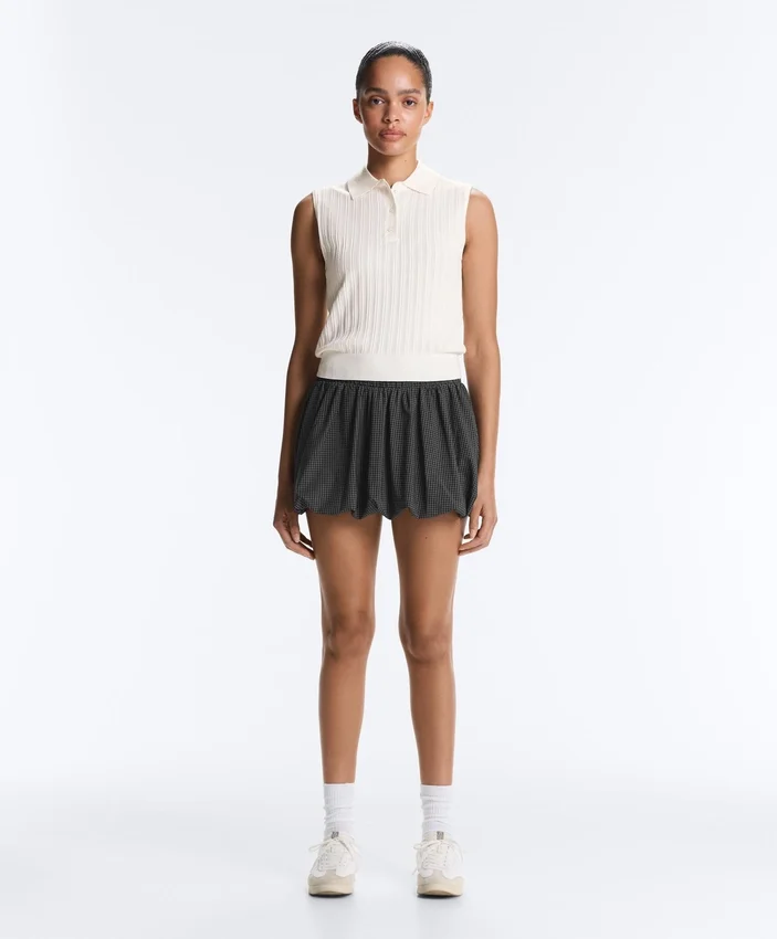 Ärmelloser Pullover aus offenem Strick Ärmelloser Pullover aus offenem Strick