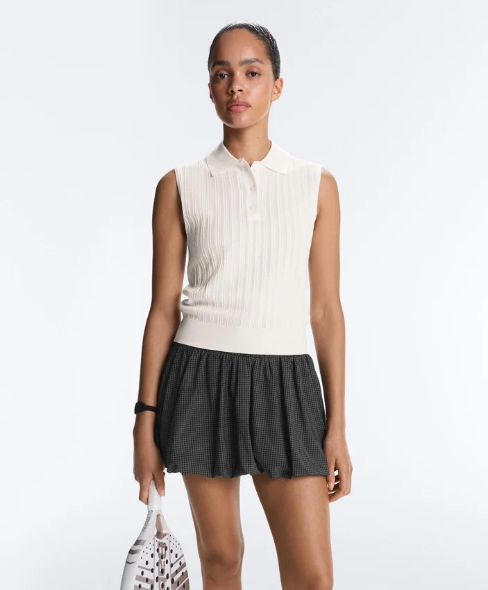 Ärmelloser Pullover aus offenem Strick Ärmelloser Pullover aus offenem Strick