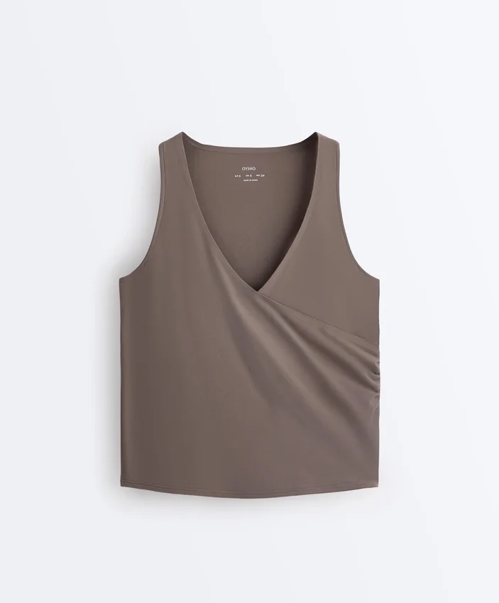 Ärmelloses Comfortlux-T-Shirt mit Überkreuz-Ausschnitt Ärmelloses Comfortlux-T-Shirt mit Überkreuz-Ausschnitt