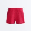 Shorts aus gewaschenem Strick mit Zopfmuster Shorts aus gewaschenem Strick mit Zopfmuster