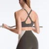 Sport-BH mit festem Halt, Compressive-Wirkung und reflektierenden Details Sport-BH mit festem Halt, Compressive-Wirkung und reflektierenden Details