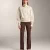 Strickjacke mit kontrastierendem Reißverschluss Strickjacke mit kontrastierendem Reißverschluss