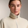 Strickjacke mit kontrastierendem Reißverschluss Strickjacke mit kontrastierendem Reißverschluss