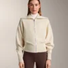 Strickjacke mit kontrastierendem Reißverschluss Strickjacke mit kontrastierendem Reißverschluss