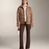 Strickjacke mit kontrastierendem Reißverschluss Strickjacke mit kontrastierendem Reißverschluss