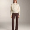 Strickjacke mit kontrastierendem Reißverschluss Strickjacke mit kontrastierendem Reißverschluss
