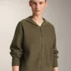 Strukturierte Strickjacke mit Kapuze Strukturierte Strickjacke mit Kapuze