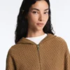 Strukturierte Strickjacke mit Kapuze Strukturierte Strickjacke mit Kapuze