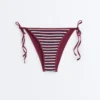 Strukturierter, gestreifter Bikini-Slip mit mittlerer Bedeckung und Bindebändern Strukturierter, gestreifter Bikini-Slip mit mittlerer Bedeckung und Bindebändern