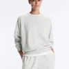 Sweatshirt aus Baumwollmischung mit Rundhalsausschnitt und meliertem Fleece Sweatshirt aus Baumwollmischung mit Rundhalsausschnitt und meliertem Fleece