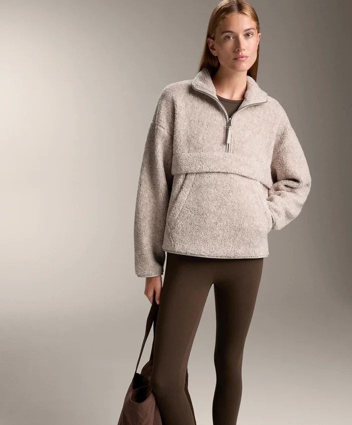 Sweatshirt aus Lammfelljacken mit Vordertasche Sweatshirt aus Lammfelljacken mit Vordertasche