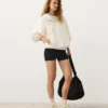 Sweatshirt mit halbem Reißverschluss, Fronttasche, aus einer Mischung aus Lyocell und 24 % Leinen Sweatshirt mit halbem Reißverschluss, Fronttasche, aus einer Mischung aus Lyocell und 24 % Leinen