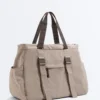 Tasche mit verstellbarem Riemen Tasche mit verstellbarem Riemen